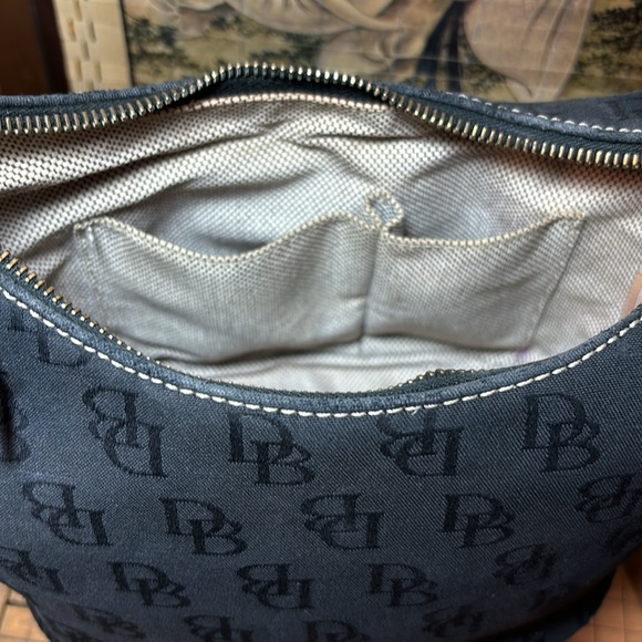 Dooney & Bourke Bucket Bag Black Signature Monogram 8”Lx5.5”W Center 5”H - Picture 17 of 17